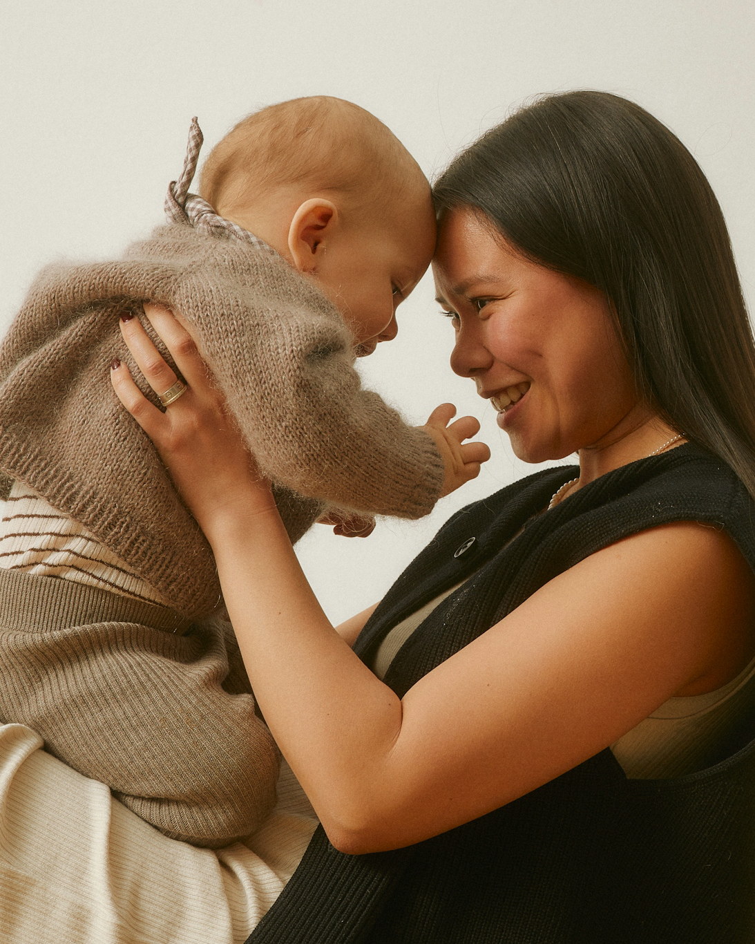 mother holding baby - breast milk is nature's superfood